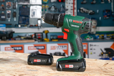 Taladro percutor BOSCH 18 V 2 baterías 1,5 AH + 241 accesorios · LEROY  MERLIN
